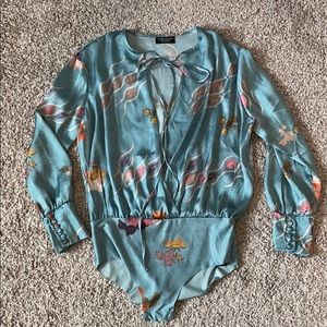 Silky Low Cut Long Sleeve Body Suit